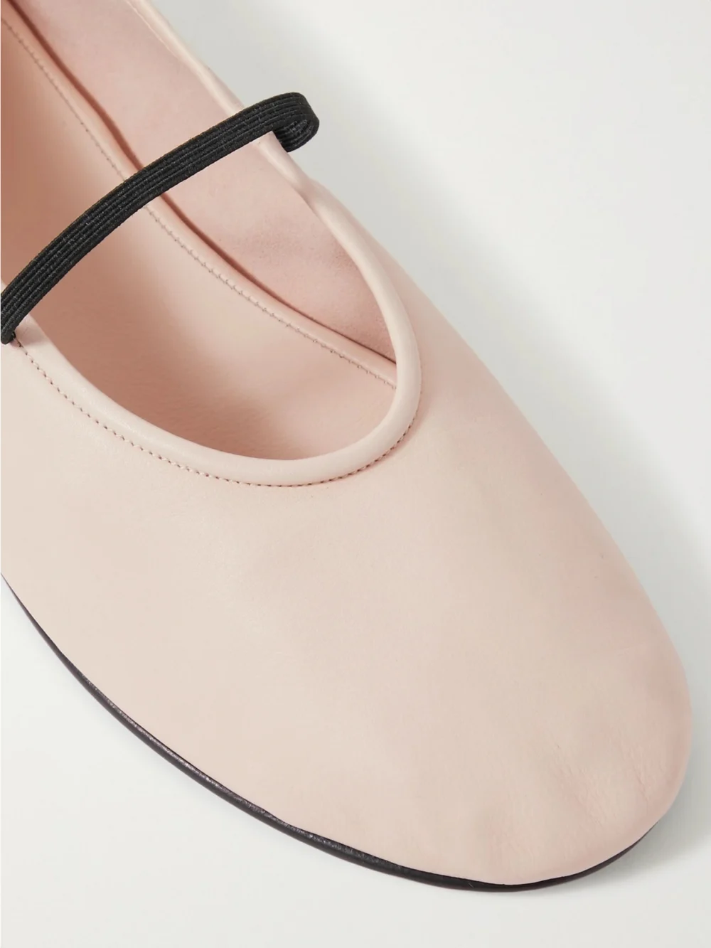 Close-up detail of The Row Elastic Leather Ballet Flats