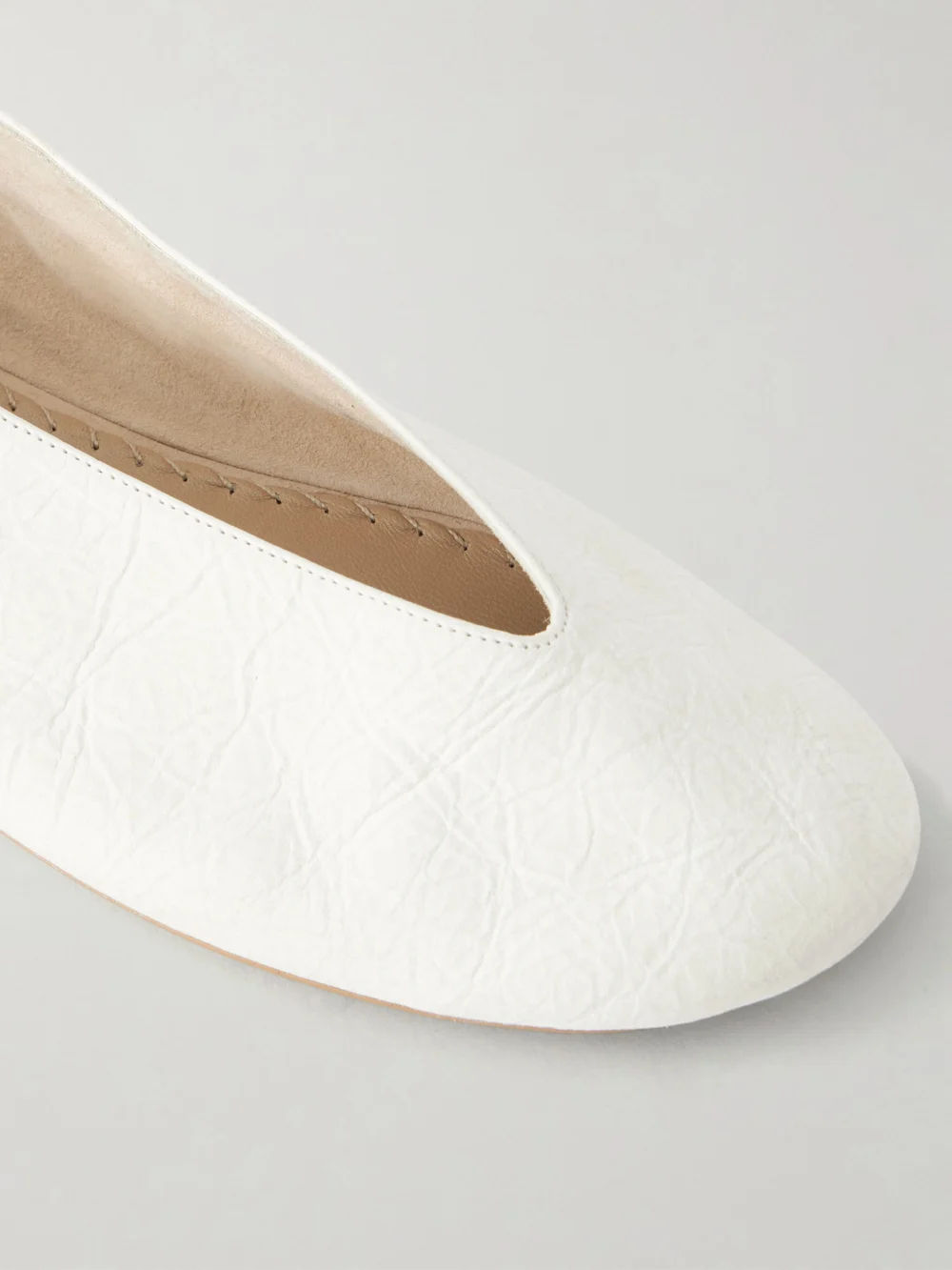 Close-up detail of The Row Fay Leather Ballet Flats