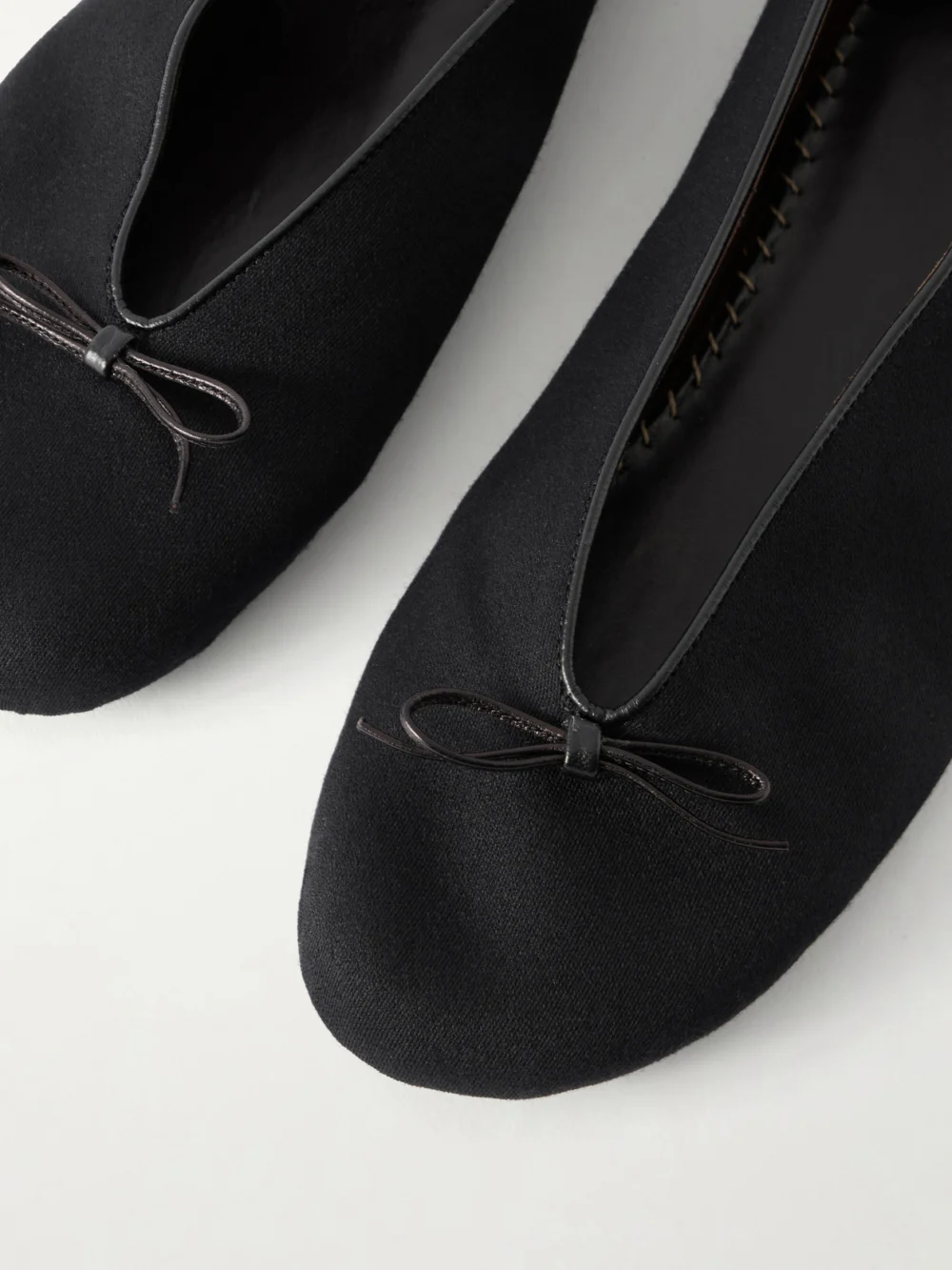 Close-up detail of The Row Fay Wool Ballet Flats