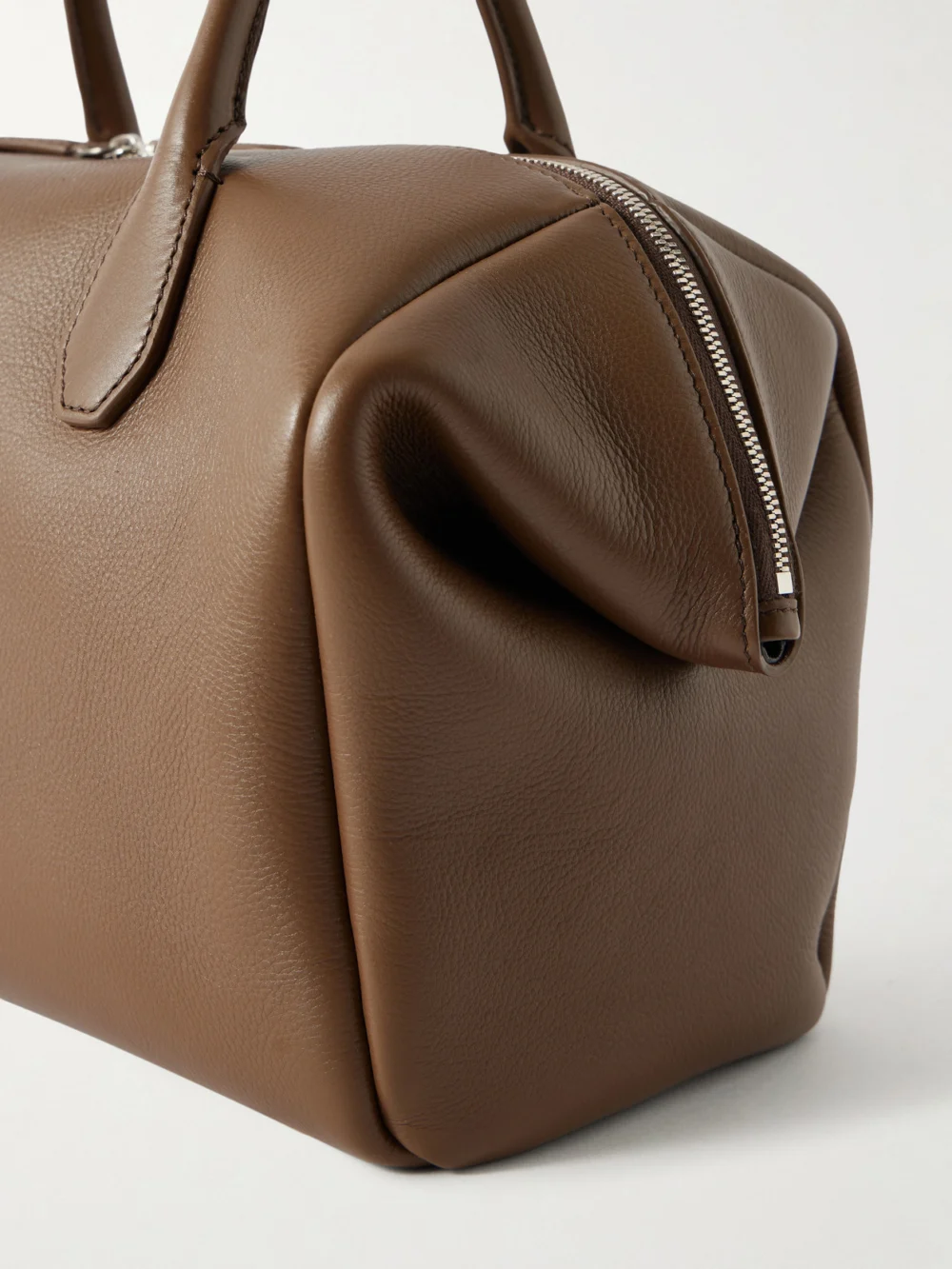 Close-up detail of The Row Faye Textured-leather Tote