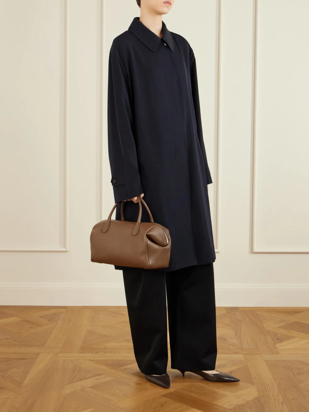 The Row Faye Textured-leather Tote, styled view