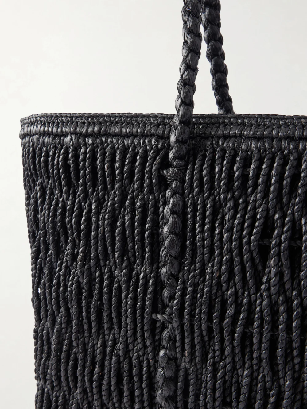 Close-up detail of The Row Georgica Leather-trimmed Raffia Tote Bag