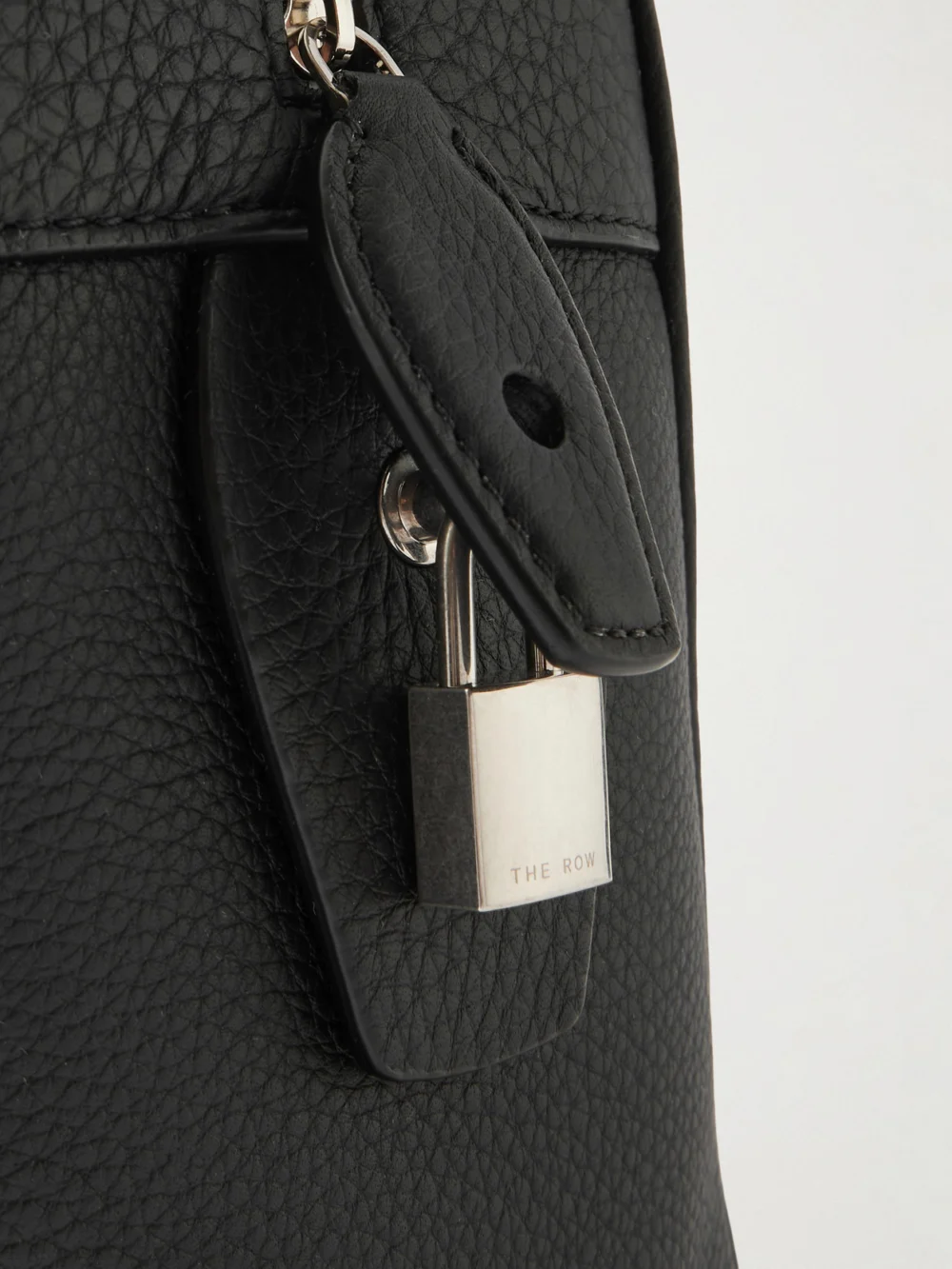 Close-up detail of The Row India 12.00 Bag Textured-leather Top-handle Bag