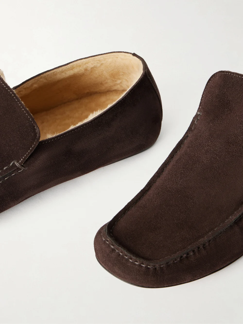 Close-up detail of The Row Leo Shearling-lined Suede Loafers