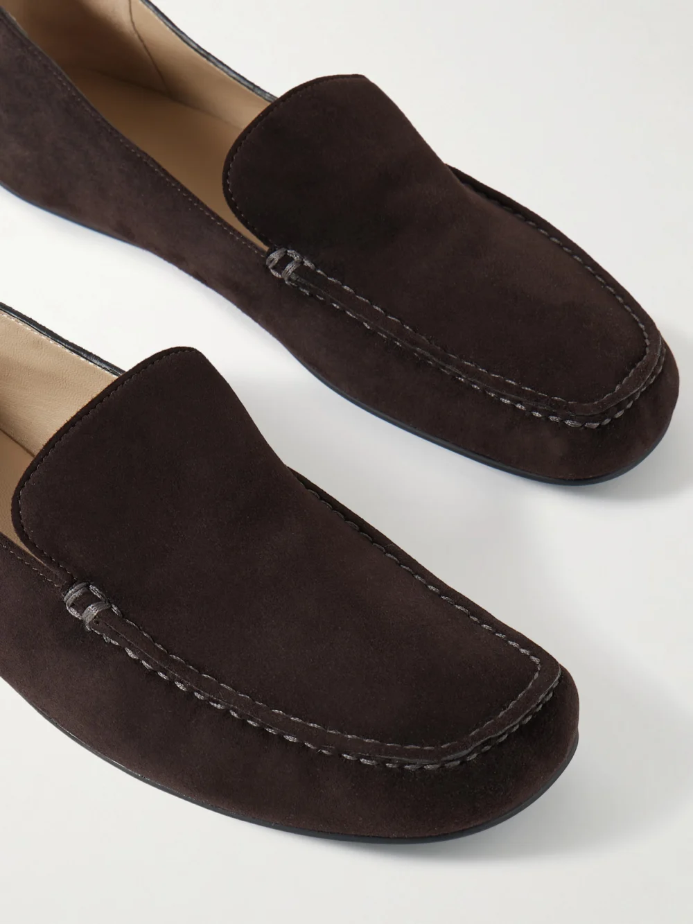 Close-up detail of The Row Leo Suede Loafers