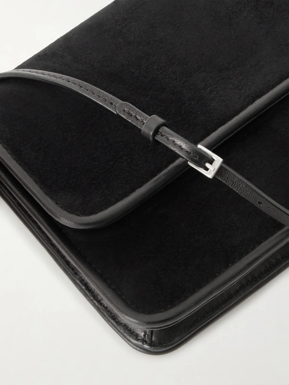 Close-up detail of The Row Nancy Leather-trimmed Suede Shoulder Bag