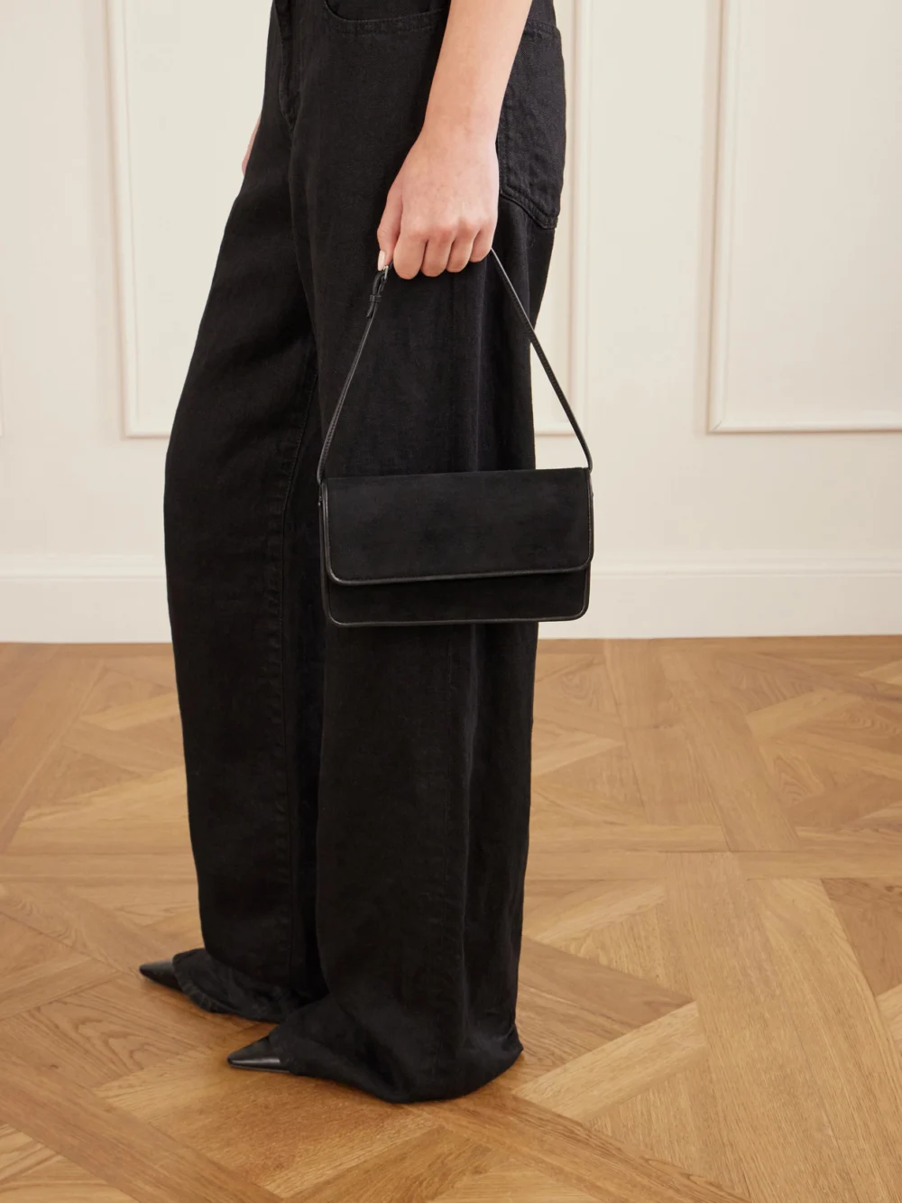 The Row Nancy Leather-trimmed Suede Shoulder Bag, styled view