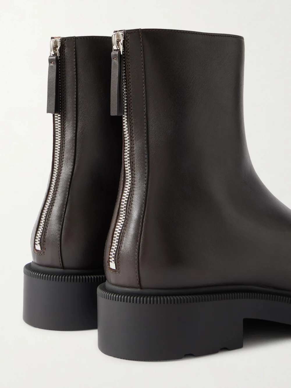 Close-up detail of The Row Nobilis Leather Ankle Boots