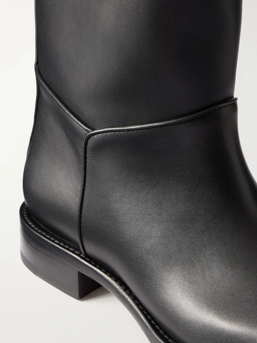 Close-up detail of The Row Nobilis Leather Knee Boots
