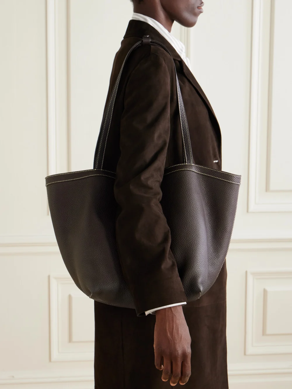 The Row Park Small Textured-leather Tote, styled view