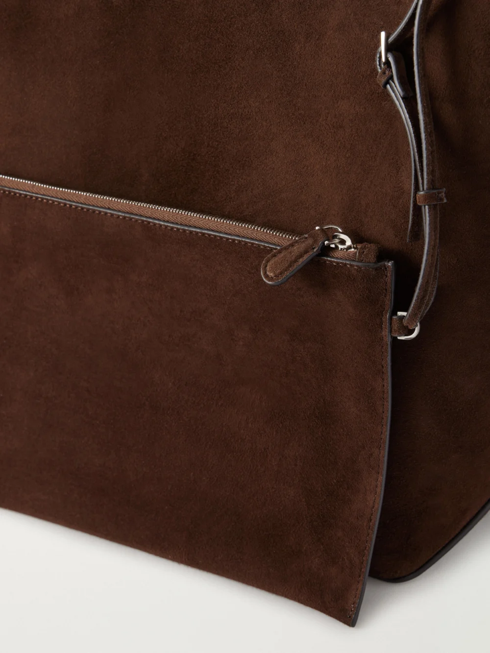 Close-up detail of The Row Park Suede Tote
