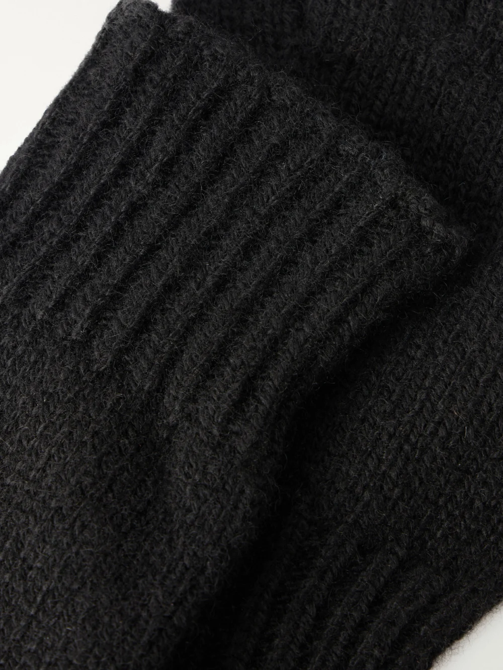 Close-up detail of The Row Pleon Cashmere Gloves