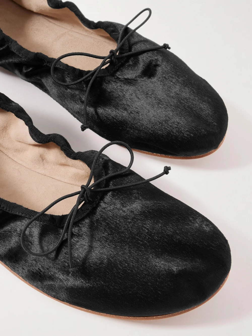 Close-up detail of The Row Round Velvet Ballet Flats