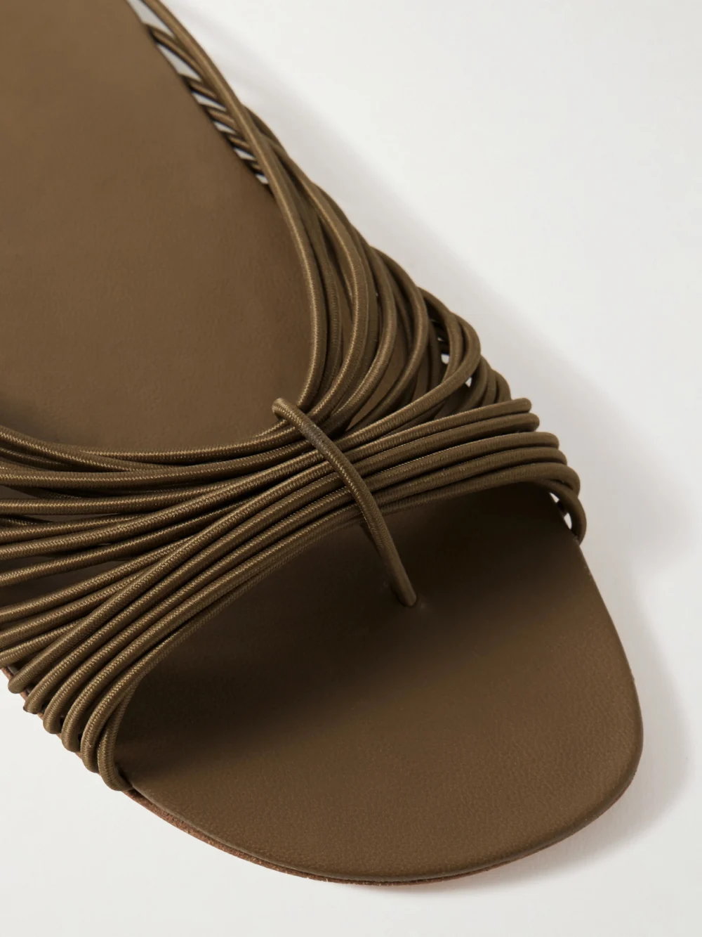 Close-up detail of The Row Sara Stretch Slides