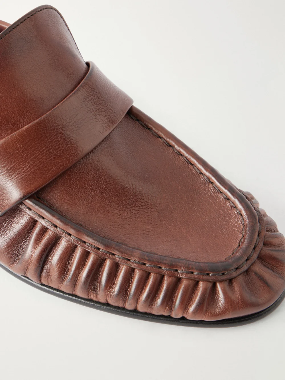 Close-up detail of The Row Soft Leather Loafers