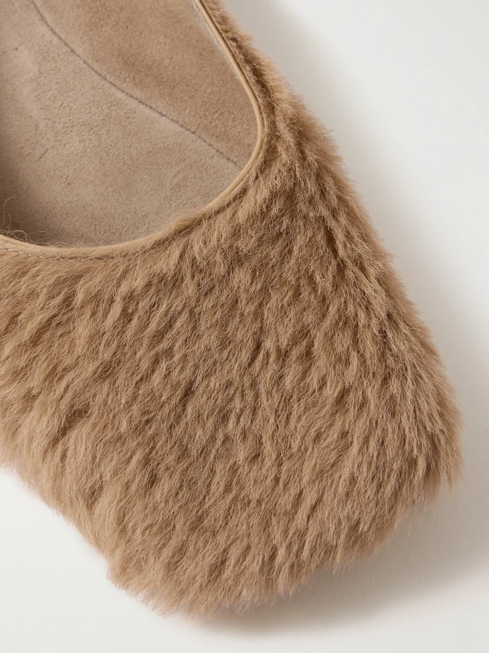 Close-up detail of The Row Square Calf Hair Ballet Flats