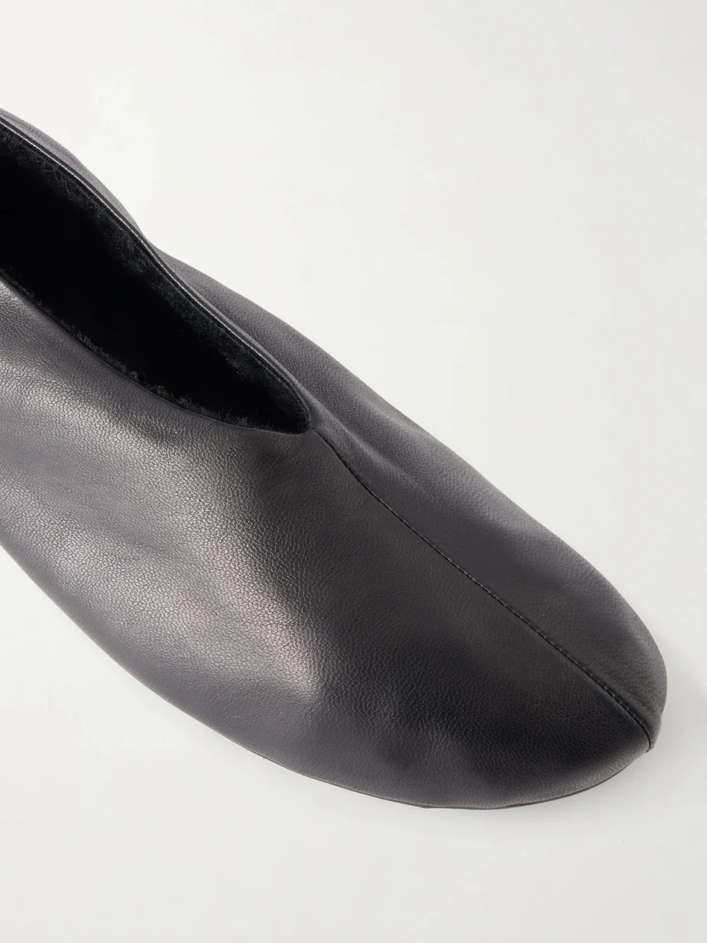 Close-up detail of The Row Stella Shearling-lined Leather Ballet Flats