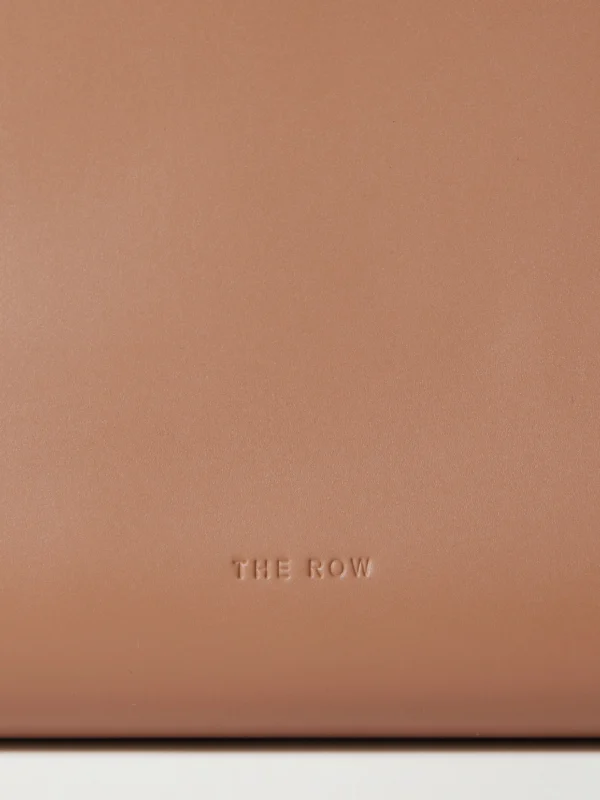 Close-up detail of The Row Sylvia Leather Clutch