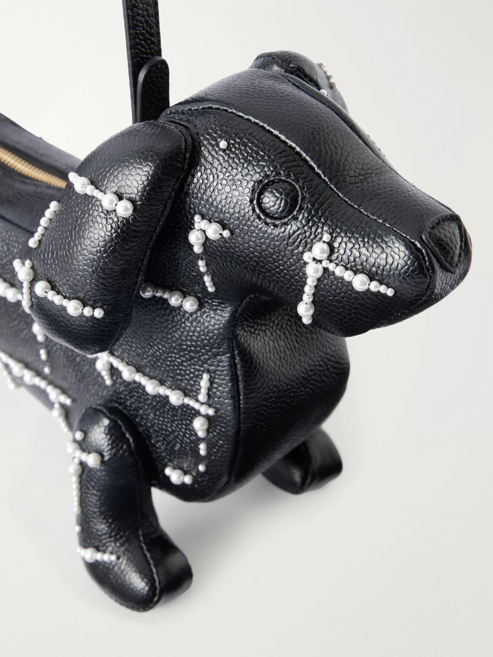 Close-up detail of the Thom Browne Baby Hector Bead-embellished Leather Tote
