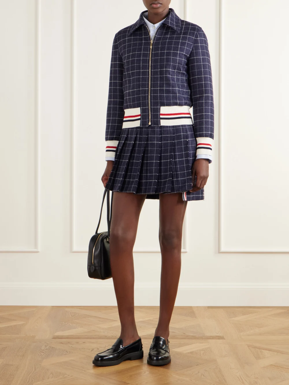 Thom Browne Cropped Padded Rib-trimmed Checked Wool-tweed Jacket, worn by a model