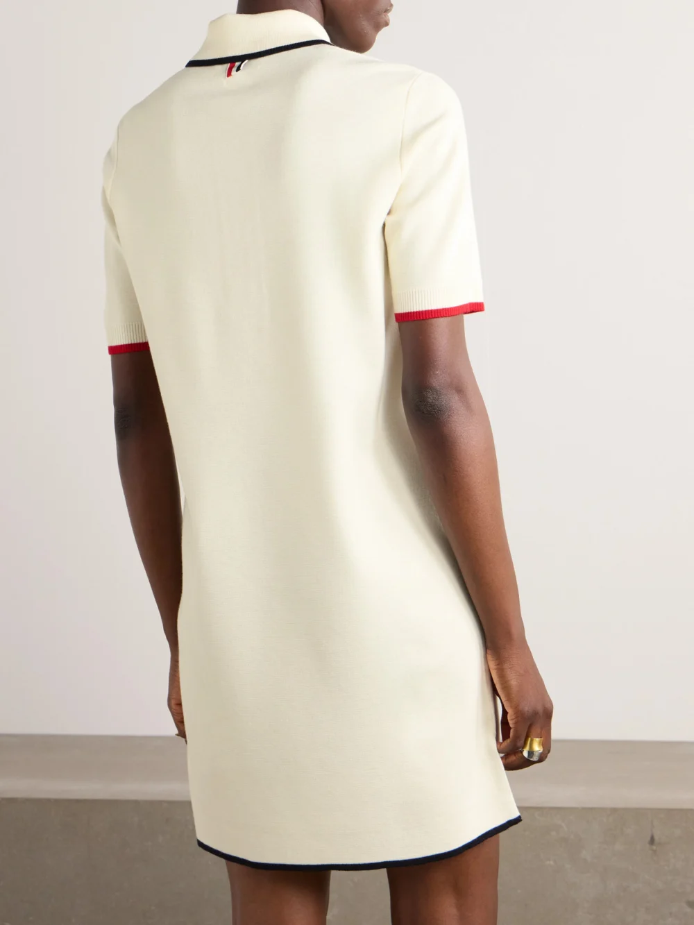 Back view of the Thom Browne Milano Striped Knitted Wool Mini Dress