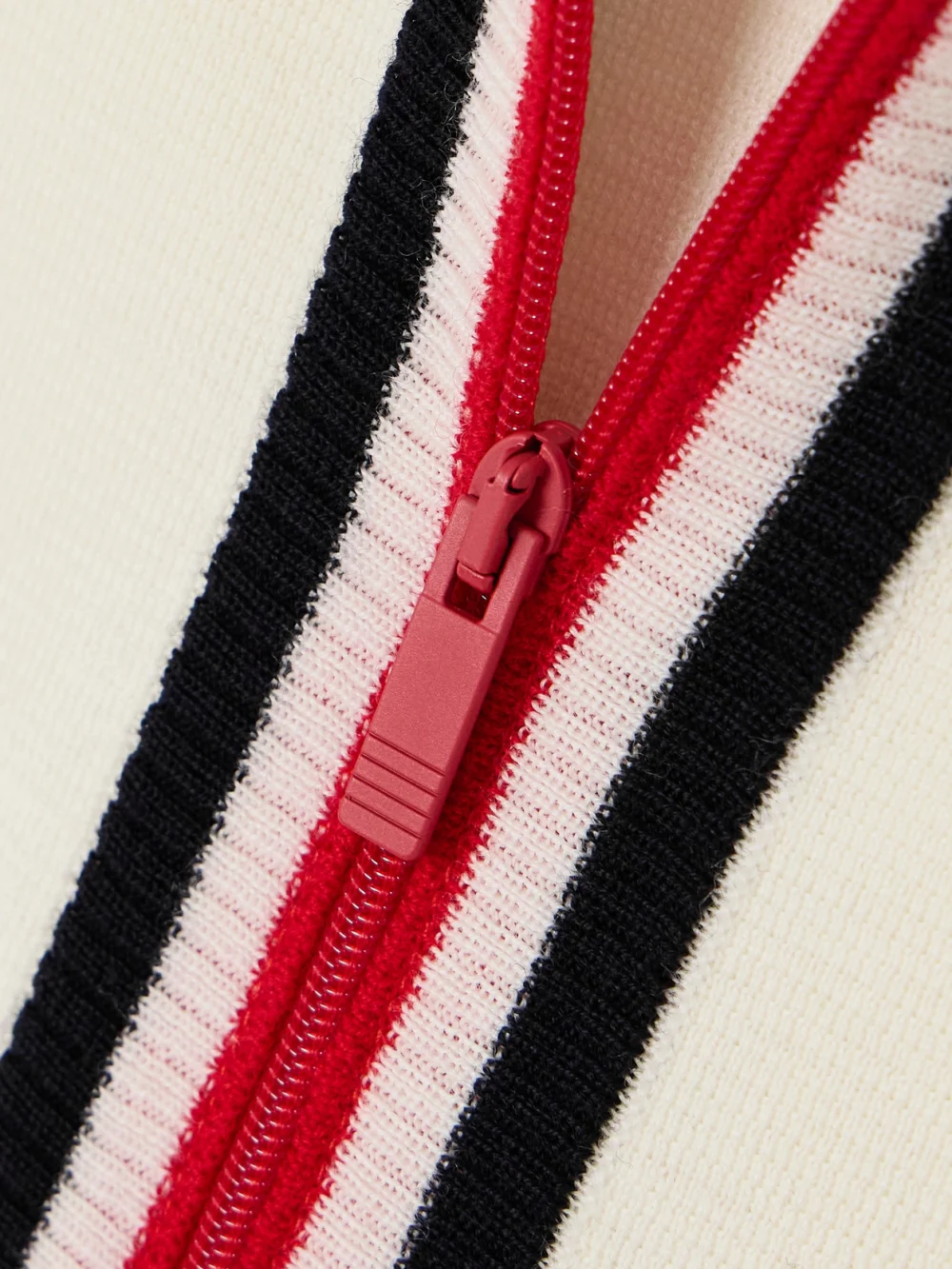 Close-up detail of the Thom Browne Milano Striped Knitted Wool Mini Dress