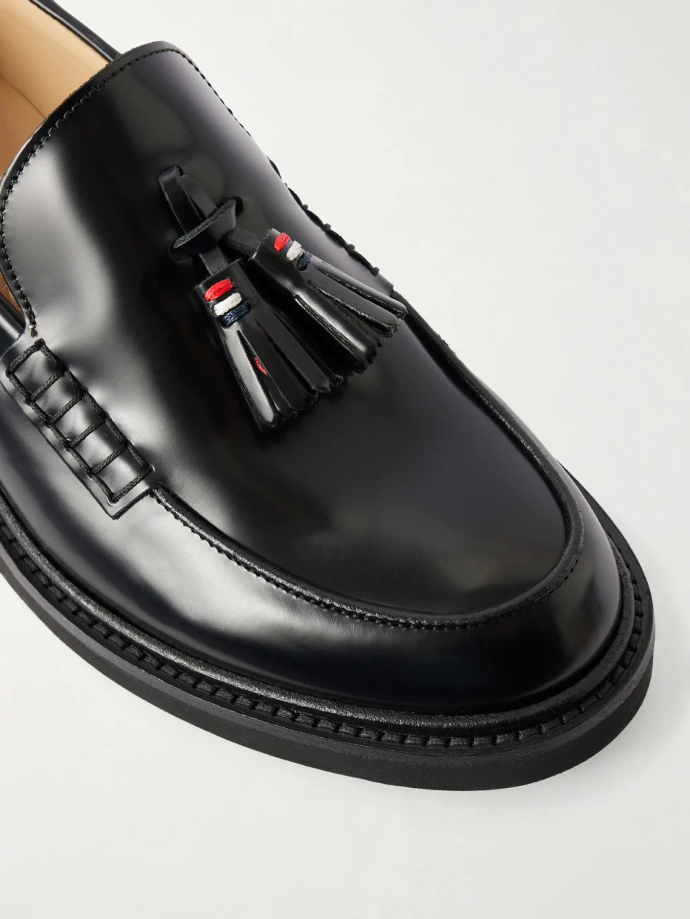 Close-up detail of the Thom Browne Tassel Leather Loafers