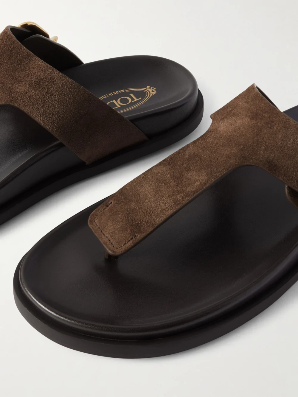 Close-up detail of the Tod's Buckled Suede Sandals