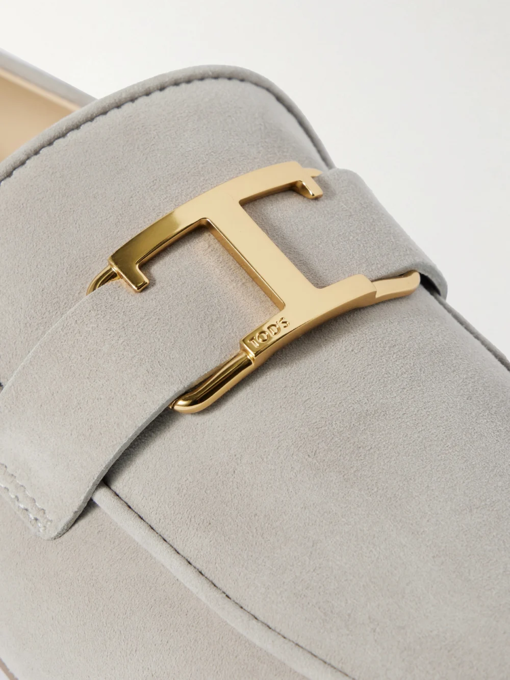 Close-up detail of the Tod's Embellished Nubuck Loafers