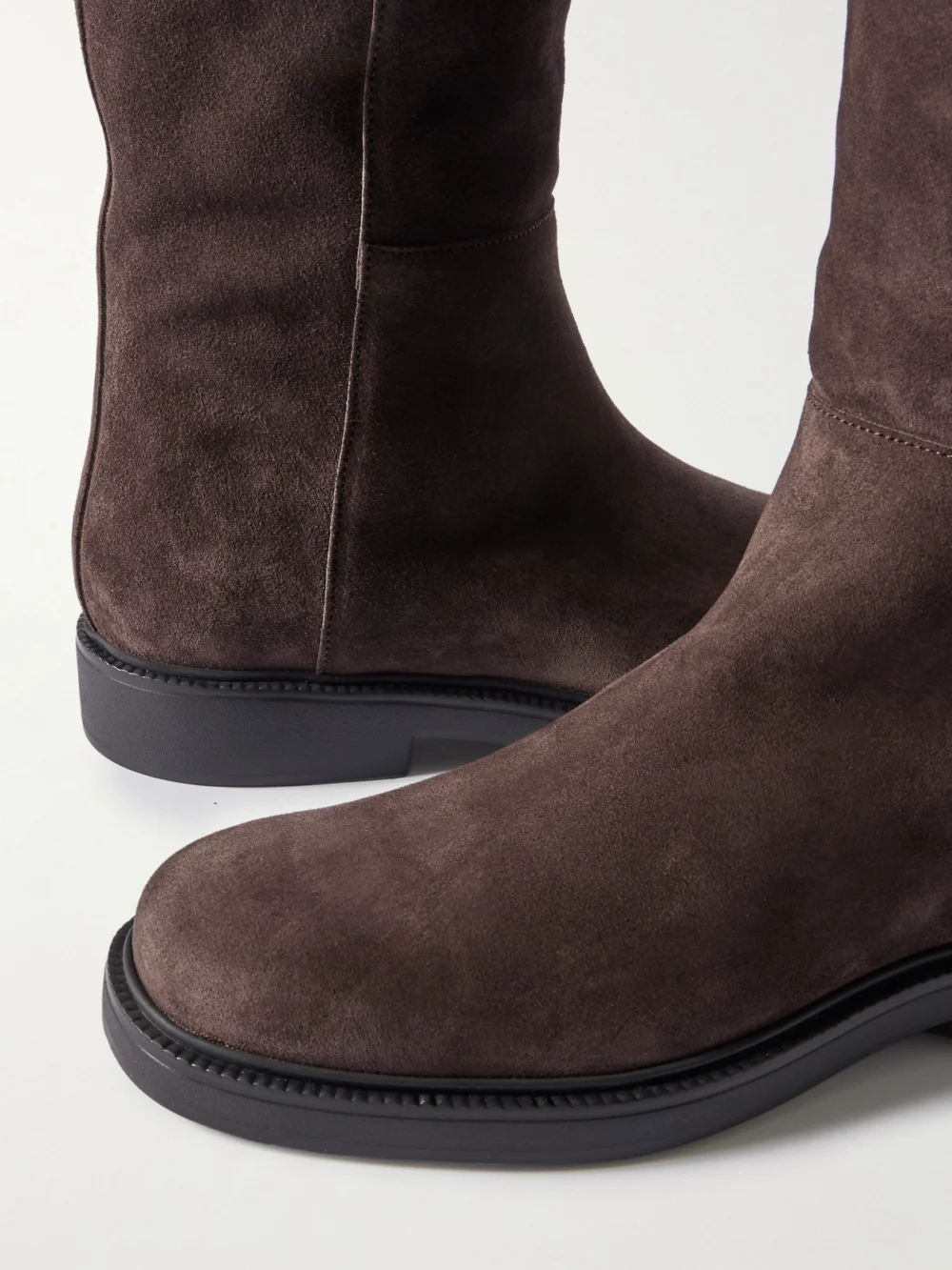 Close-up detail of the Tod's Embellished Suede Knee Boots