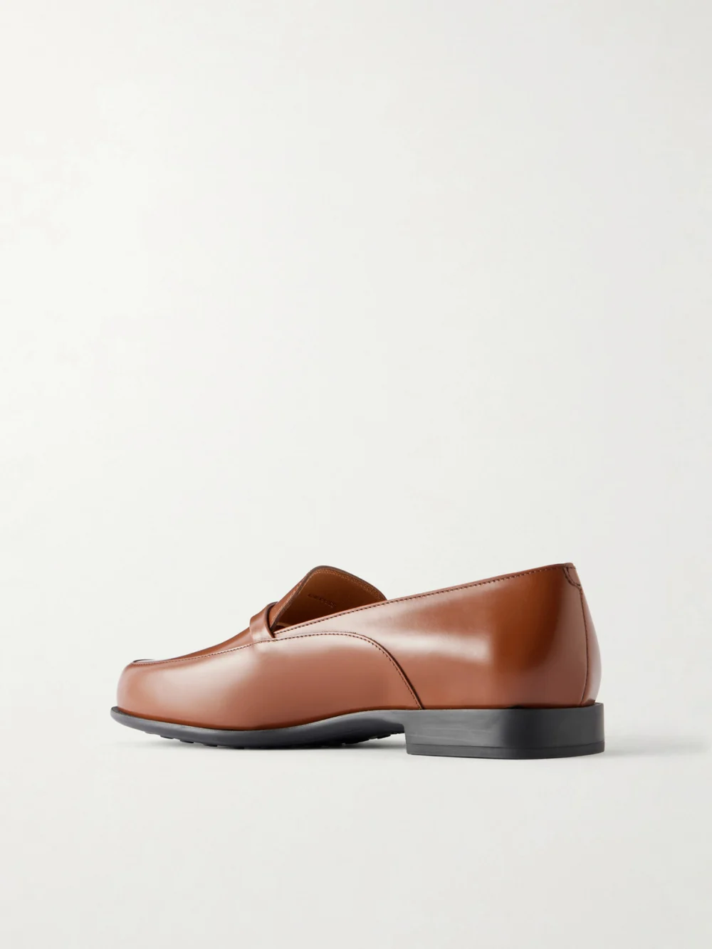 Back view of the Tod's Gomma 19 Logo-embellished Leather Loafers