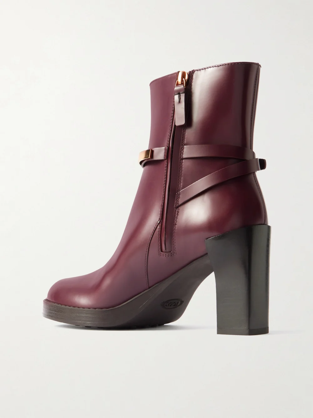 Back view of the Tod's Gomma Embellished Glossed-leather Ankle Boots