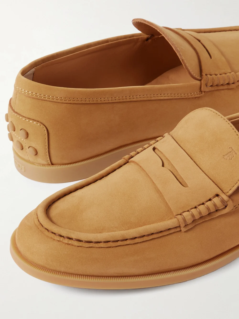 Close-up detail of the Tod's Gomma Nubuck Penny Loafers