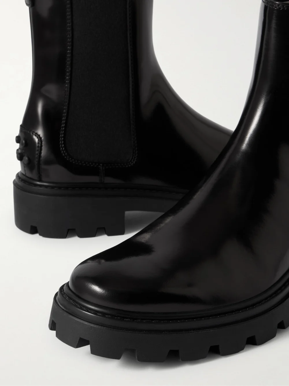 Close-up detail of the Tod's Gomma Pesante Glossed-leather Chelsea Boots