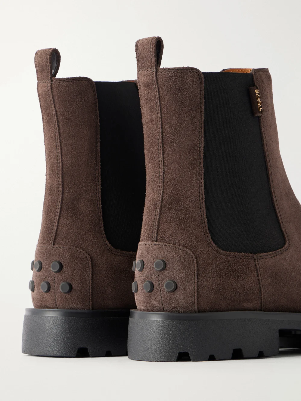 Close-up detail of the Tod's Gomma Suede Ankle Boots