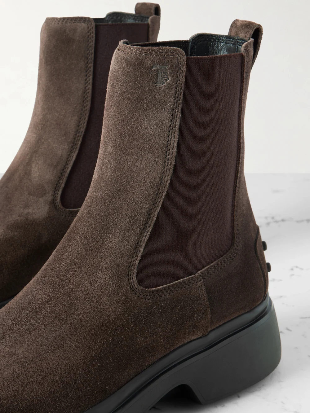 Close-up detail of the Tod's Gomma Suede Chelsea Boots