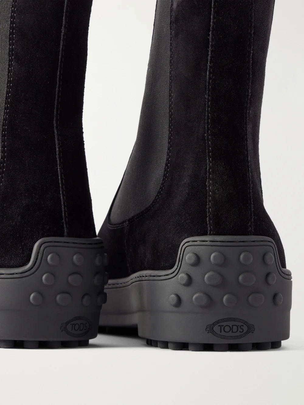 Close-up detail of the Tod's Gommino Suede Ankle Boots