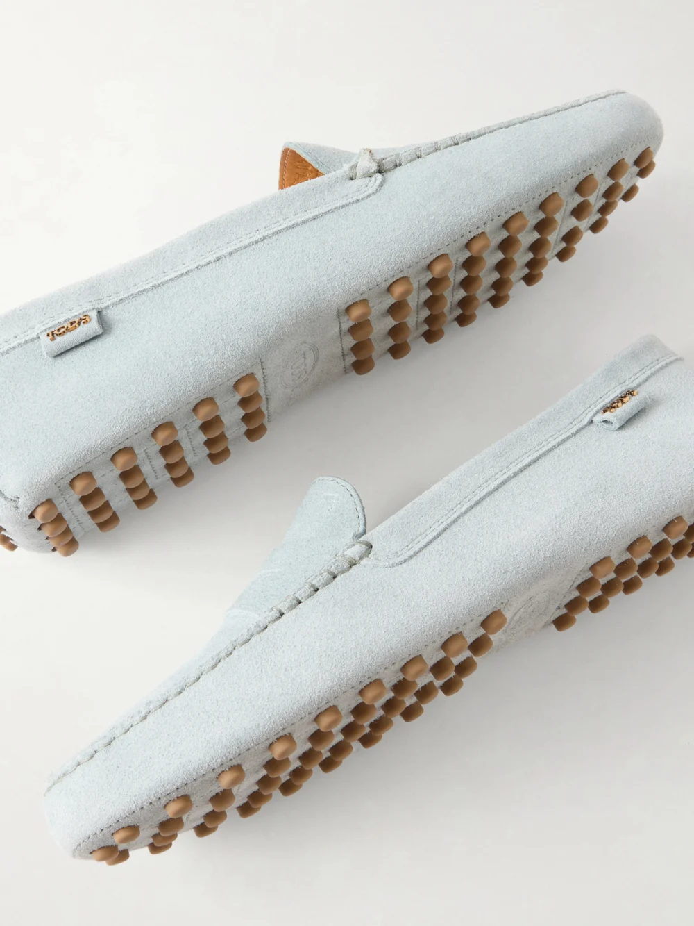 Close-up detail of the Tod's Gommino Suede Loafers