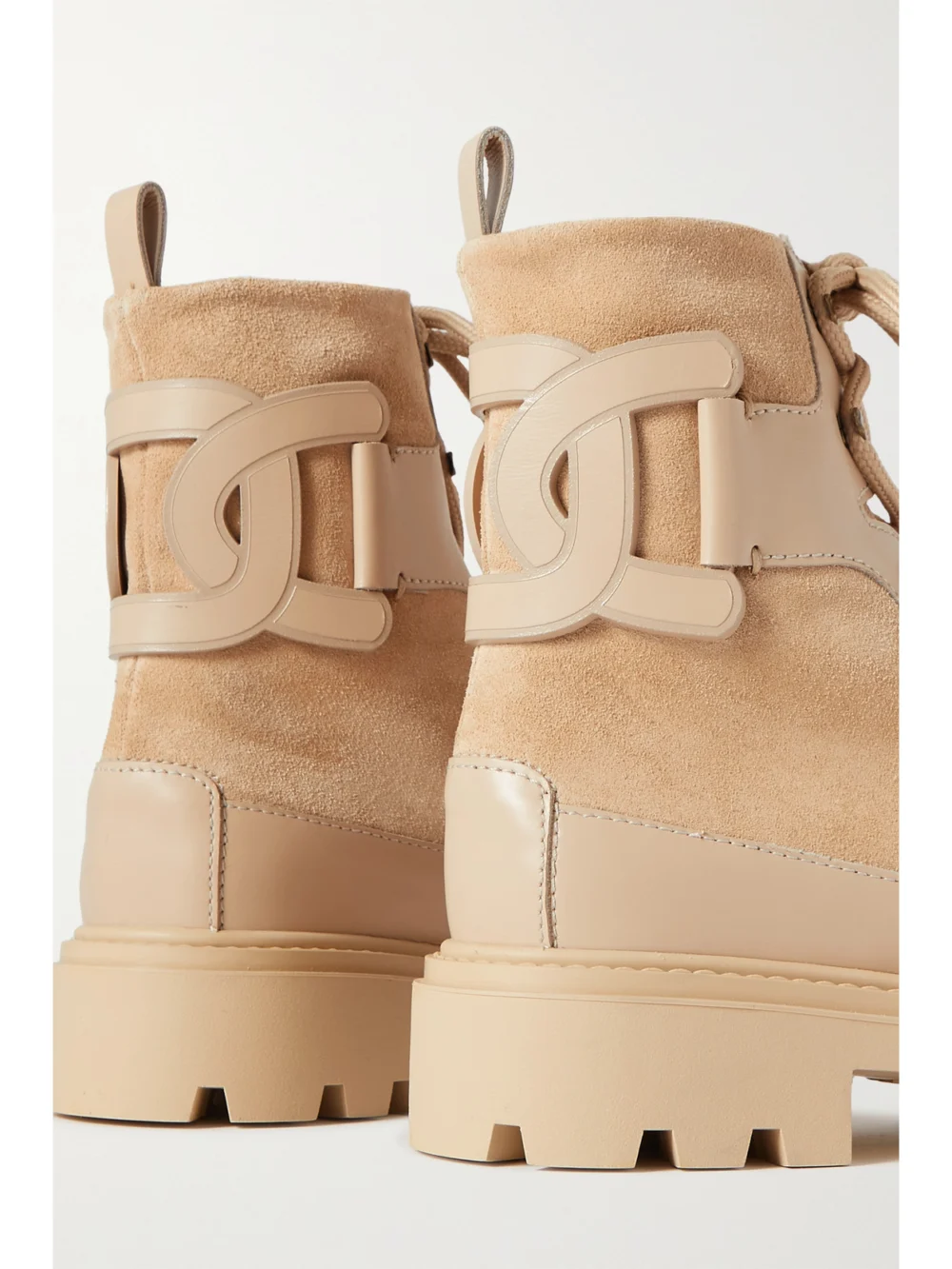 Close-up detail of the Tod's Kate Leather-trimmed Suede Ankle Boots