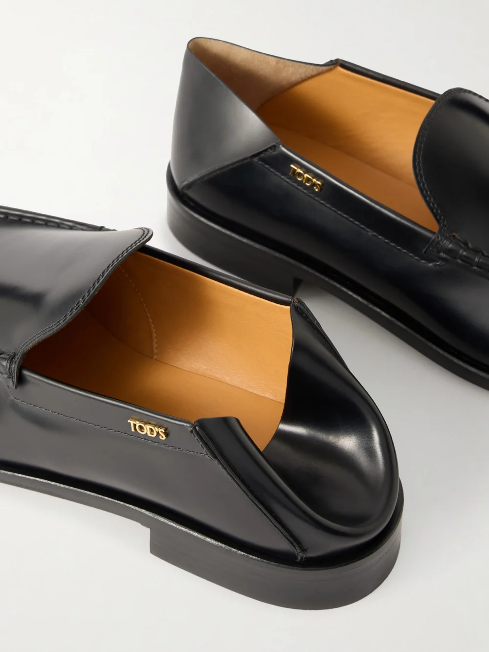 Close-up detail of the Tod's Matte Leather Loafers