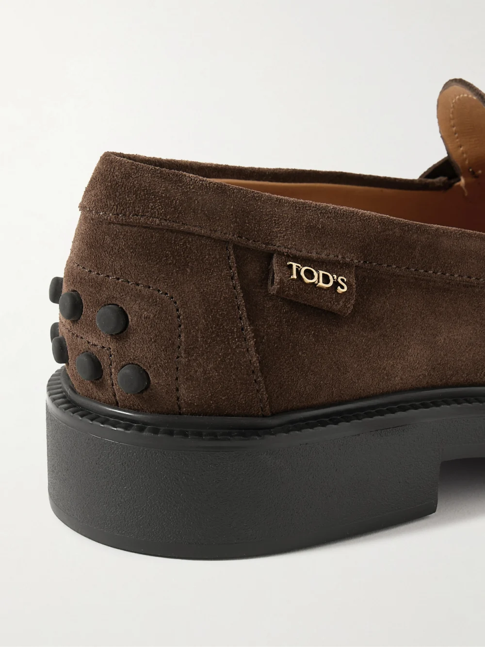Close-up detail of the Tod's Mocassino Suede Loafers