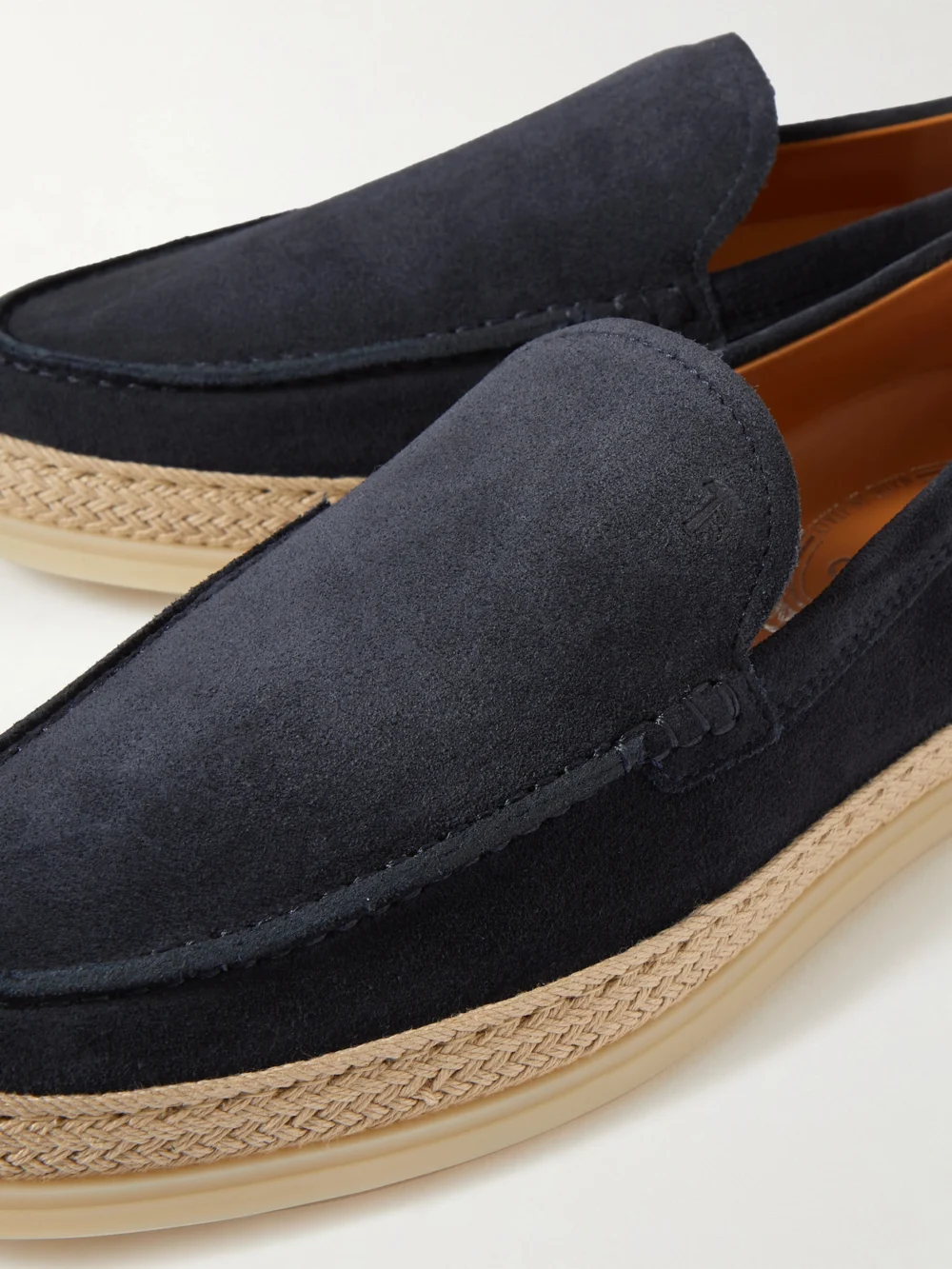 Close-up detail of the Tod's Raffia-trimmed Suede Loafers