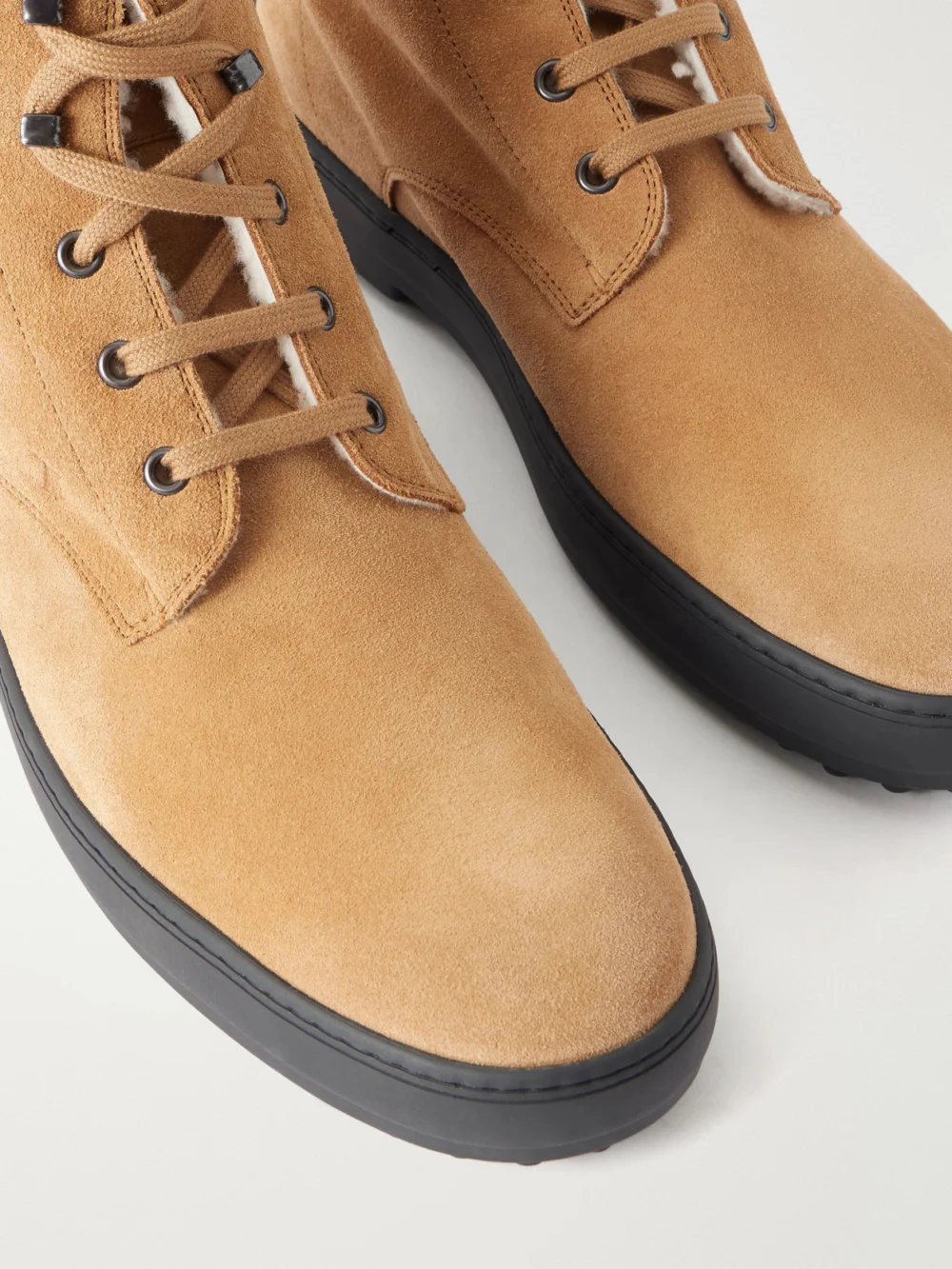 Close-up detail of the Tod's Win Gomm 84l Suede Ankle Boots