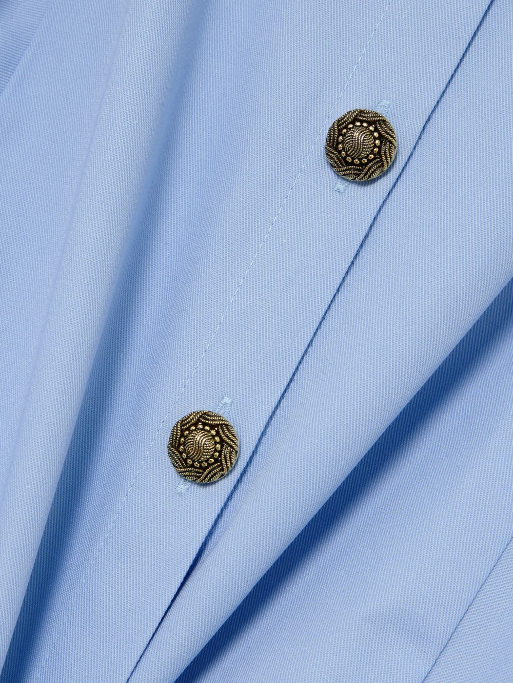 Close-up detail of the Tolu Coker Backless Pleated Gabardine Midi Shirt Dress