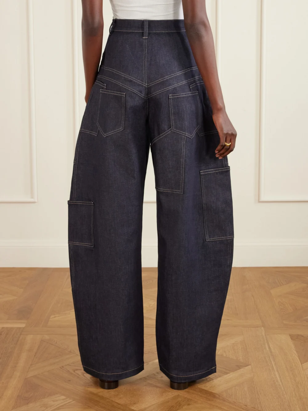 Back view of the Tolu Coker Banana Cutout High-rise Barrel-leg Jeans