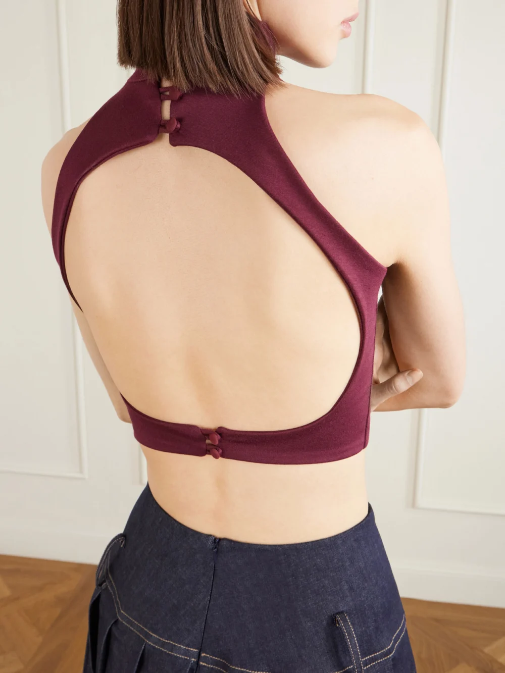 Close-up detail of the Tolu Coker Cropped Open-back Jersey Top