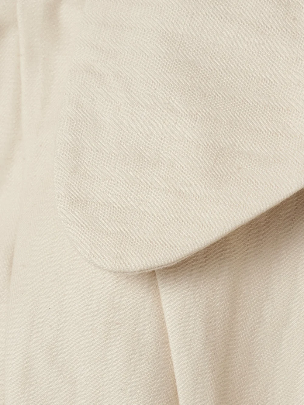 Close-up detail of the Tolu Coker Cropped Paneled Herringbone Cotton Top