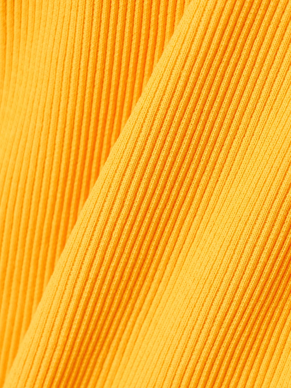 Close-up detail of the Tolu Coker Open-back Cropped Ribbed Cotton-blend Tank