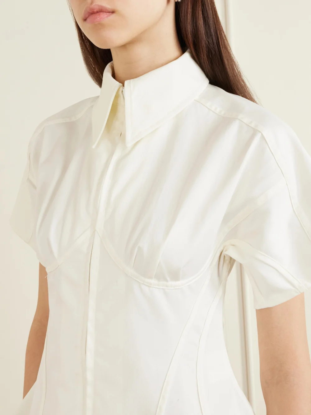 Close-up detail of the Tolu Coker Paneled Cotton-blend Twill Blouse