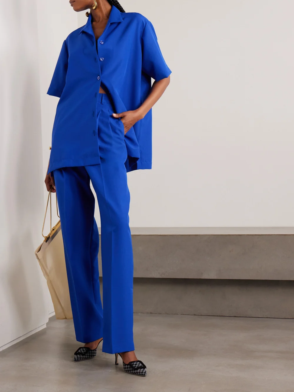 Tolu Coker Pleated Twill Straight-leg Pants, worn by a model